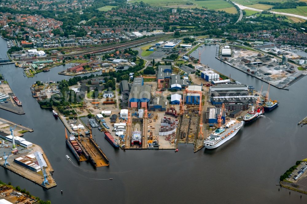 Emden from the bird's eye view: Cruise and passenger ship Amera on dock in Emden in the state Lower Saxony, Germany