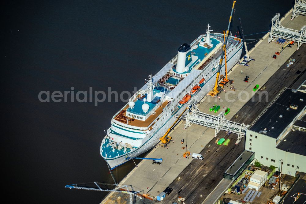 Aerial image Bremerhaven - Cruise and passenger ship MS Deutschland on street Columbuskaje in Bremerhaven in the state Bremen, Germany