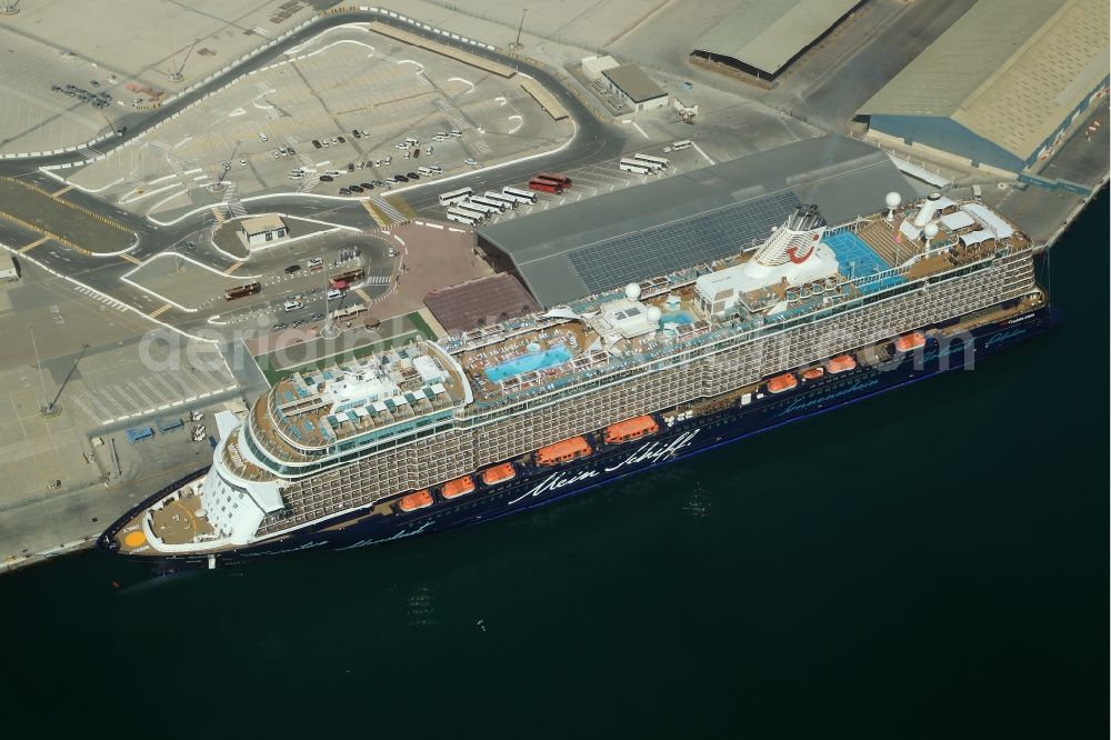 Abu Dhabi from above - Cruise and passenger ship Mein Schiff 5 at the cruise terminal in Port Zayed in Abu Dhabi in United Arab Emirates