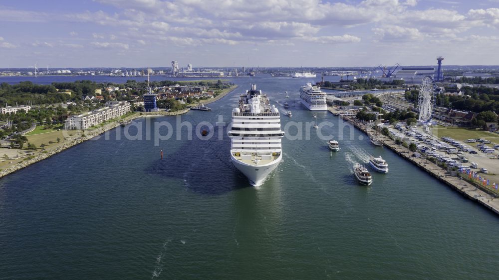 Rostock from above - Cruise and passenger ship MSC Poesia in mission of baltic sea in the district Warnemuende in Rostock at the baltic sea coast in the state Mecklenburg - Western Pomerania, Germany