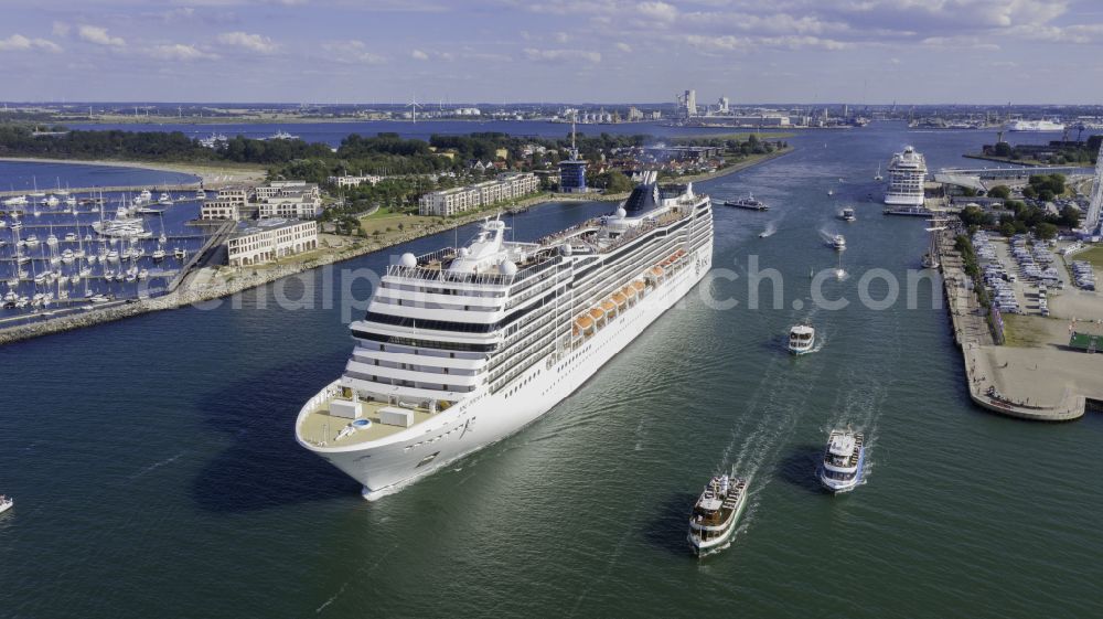 Rostock from the bird's eye view: Cruise and passenger ship MSC Poesia in mission of baltic sea in the district Warnemuende in Rostock at the baltic sea coast in the state Mecklenburg - Western Pomerania, Germany