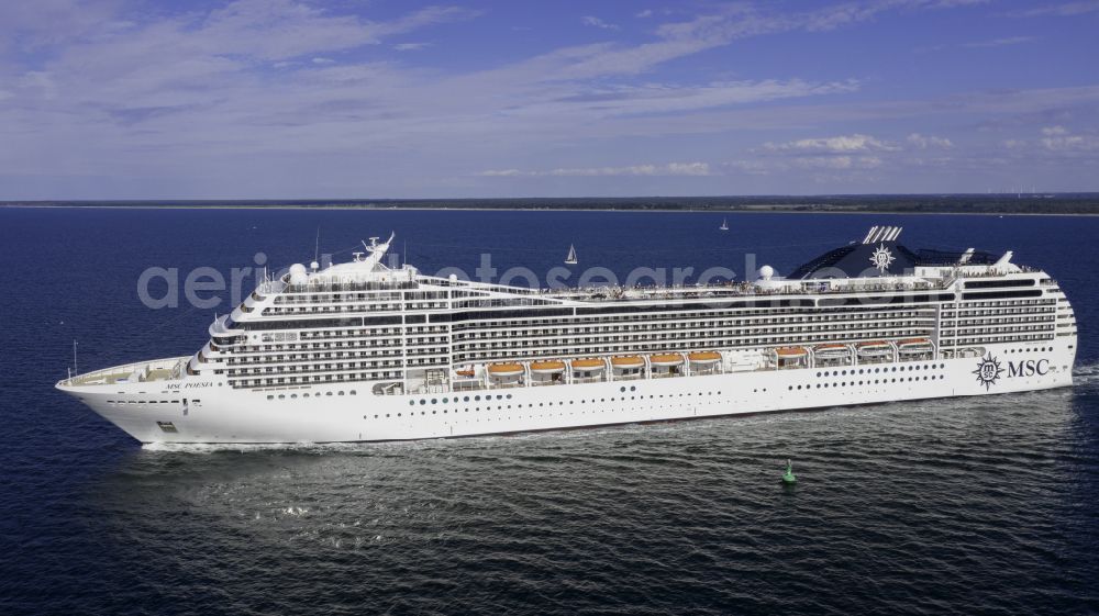 Rostock from above - Cruise and passenger ship MSC Poesia in mission of baltic sea in the district Warnemuende in Rostock at the baltic sea coast in the state Mecklenburg - Western Pomerania, Germany