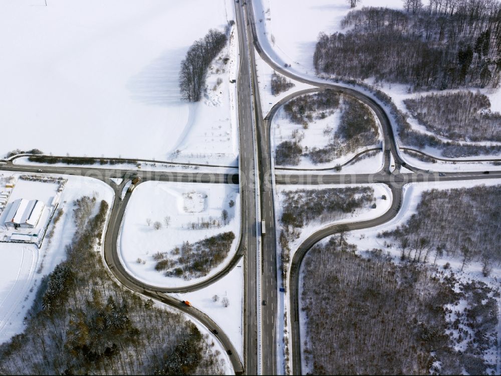 Aerial image Marktl - Intersection of the federal highways 20 and 25 in the south of the borough of Marktl in the state of Bavaria. The highway 25 runs from the West to the East and crosses the 20 in a forest