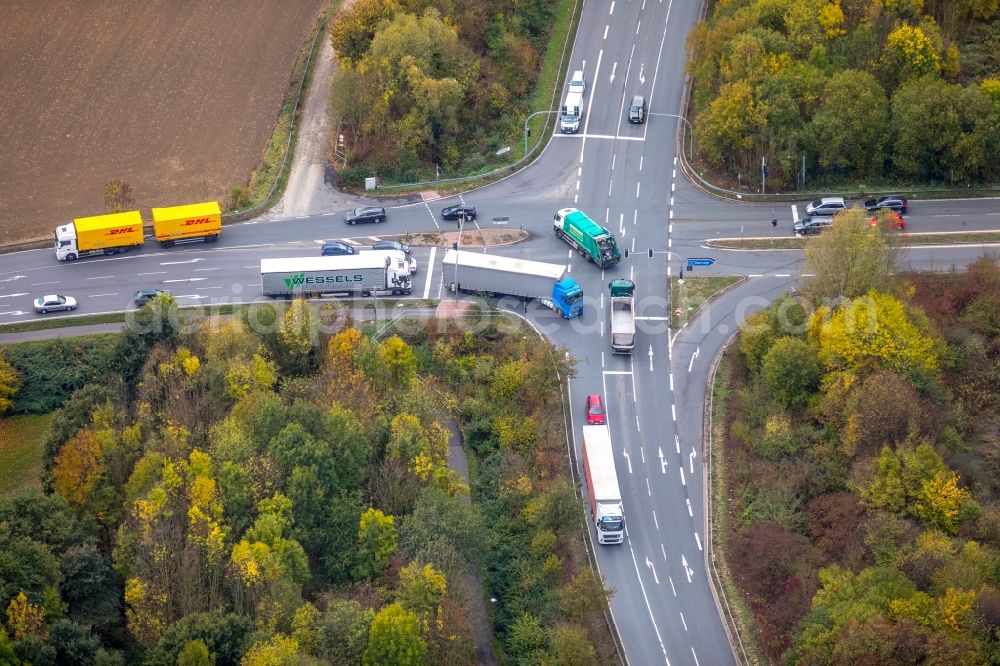 Aerial photograph Bönen - Road over the crossroads Rhynerner Strasse - L665 in Boenen in the state North Rhine-Westphalia, Germany