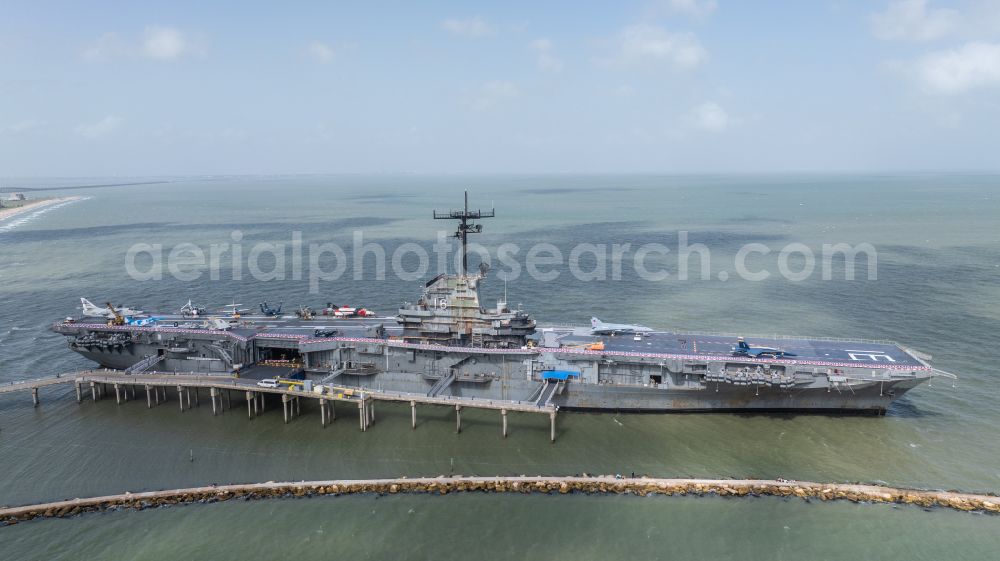 Corpus Christi from above - Ship of the Navy USS Lexington, CV-16, Essex-Class Aircraft Carrier on street North Shoreline Boulevard in Corpus Christi in Texas, United States of America