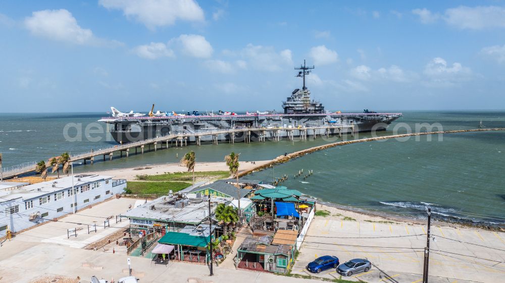 Corpus Christi from the bird's eye view: Ship of the Navy USS Lexington, CV-16, Essex-Class Aircraft Carrier on street North Shoreline Boulevard in Corpus Christi in Texas, United States of America