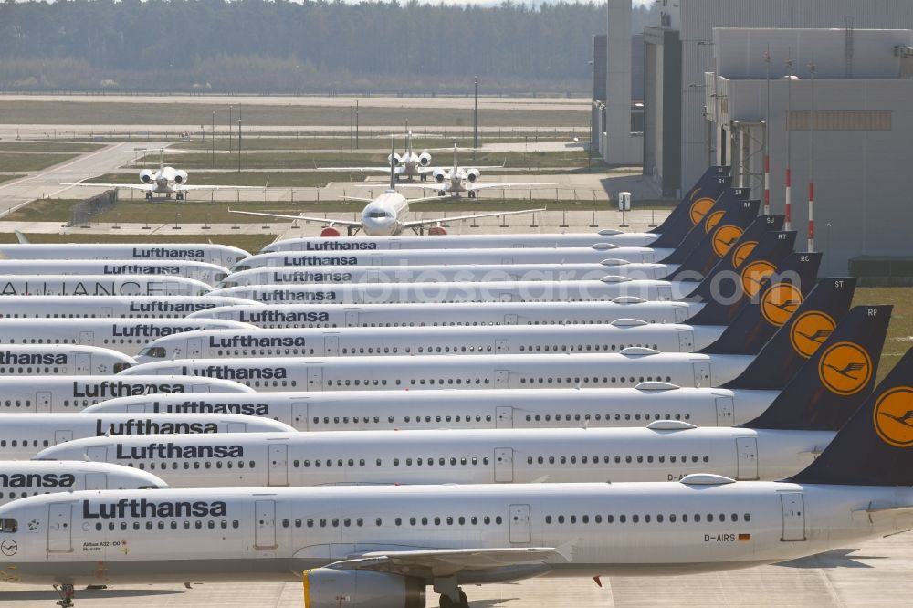 Selchow from the bird's eye view: Decommissioned due to crisis passenger airplanes of the airline Lufthansa in parking position - parking area at the BER - airport in Schoenefeld in the state Brandenburg, Germany