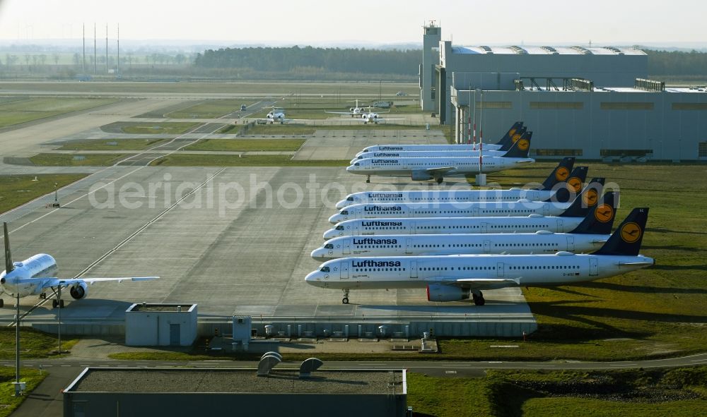 Schönefeld from the bird's eye view: Decommissioned due to crisis passenger airplanes of the airline Lufthansa in parking position - parking area at the airport in Schoenefeld in the state Brandenburg, Germany