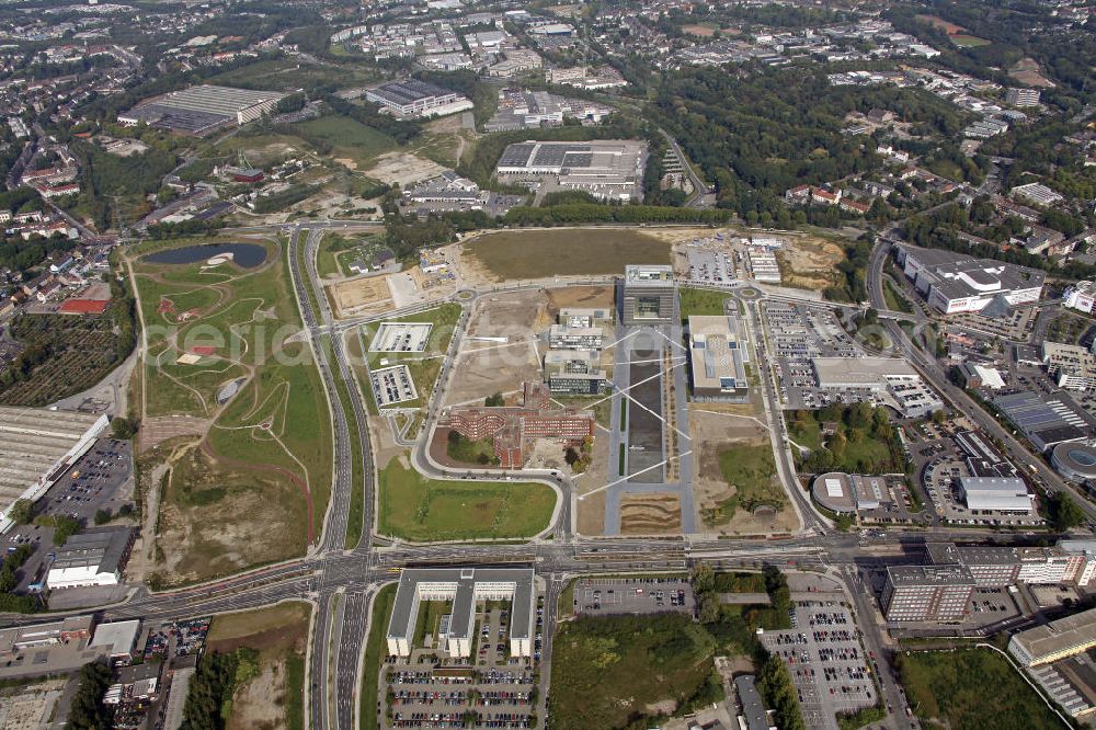 Aerial image Essen - Blick auf den Krupp-Gürtel in Essen. Auf dem Gelände der ehemaligen Kruppschen Gussstahlwerke entstanden im Rahmen eines Städtebauprojekts die Hauptverwaltung ThyssenKrupp AG Hauptverwaltung, ein Boulevard und zukünftig eine Parkanlage. View of the Krupp-Belt in Essen. An urban project was created at the site of the former Krupp cast steel works. Here are the main administrative headquarters ThyssenKrupp AG, a boulevard and a park in the future.