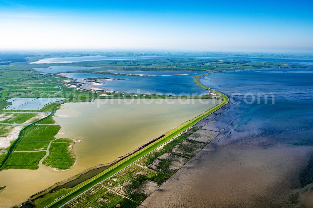 Reußenköge from the bird's eye view: Coastline with dike protection strips beim Luettmoorsee in Reussenkoege in the state Schleswig-Holstein, Germany