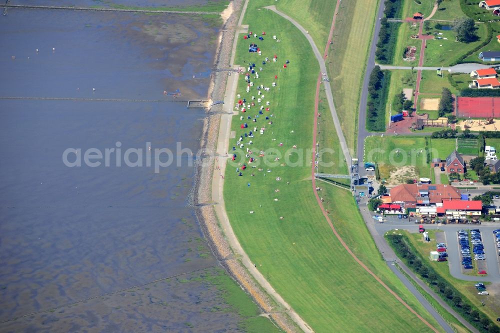 Friedrichskoog from the bird's eye view: Coastline with dike protection strips in Friedrichskoog in the state Schleswig-Holstein