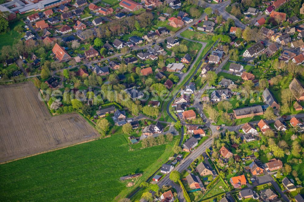 Wurster Nordseeküste from the bird's eye view: Coastline with dike protection strips in Wremen in Wurster Nordseekueste in Lower Saxony