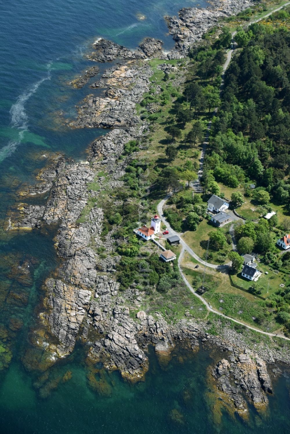 Allinge from above - Coastline at the rocky cliffs of Baltic Sea on Bornholm Island in Allinge in Region Hovedstaden, Denmark