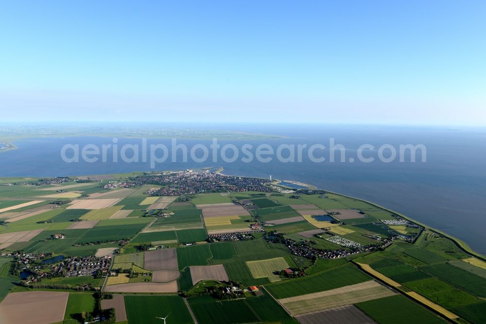 Büsum from above - Coastline at the North Sea with tilled fields in Buesum in the state Schleswig-Holstein