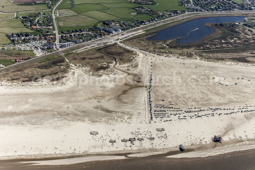 Sankt Peter-Ording from the bird's eye view: Coastline on the sandy beach of Badestelle Ording Nord in the district Sankt Peter-Ording in Sankt Peter-Ording in the state Schleswig-Holstein