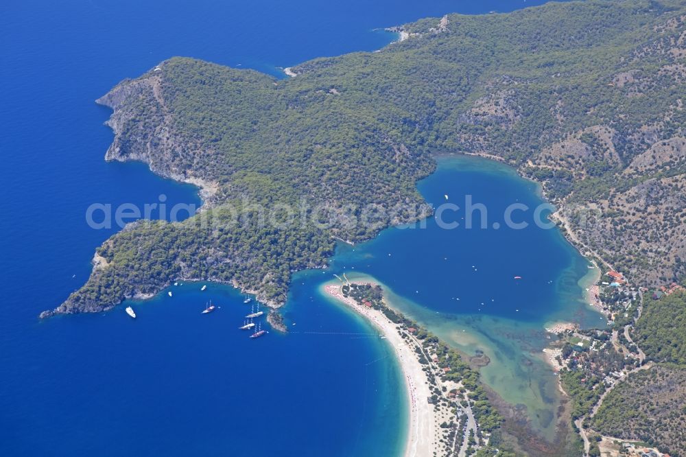 Ölüdeniz from the bird's eye view: Coastline with the sandy beach of Oeluedeniz in Turkey