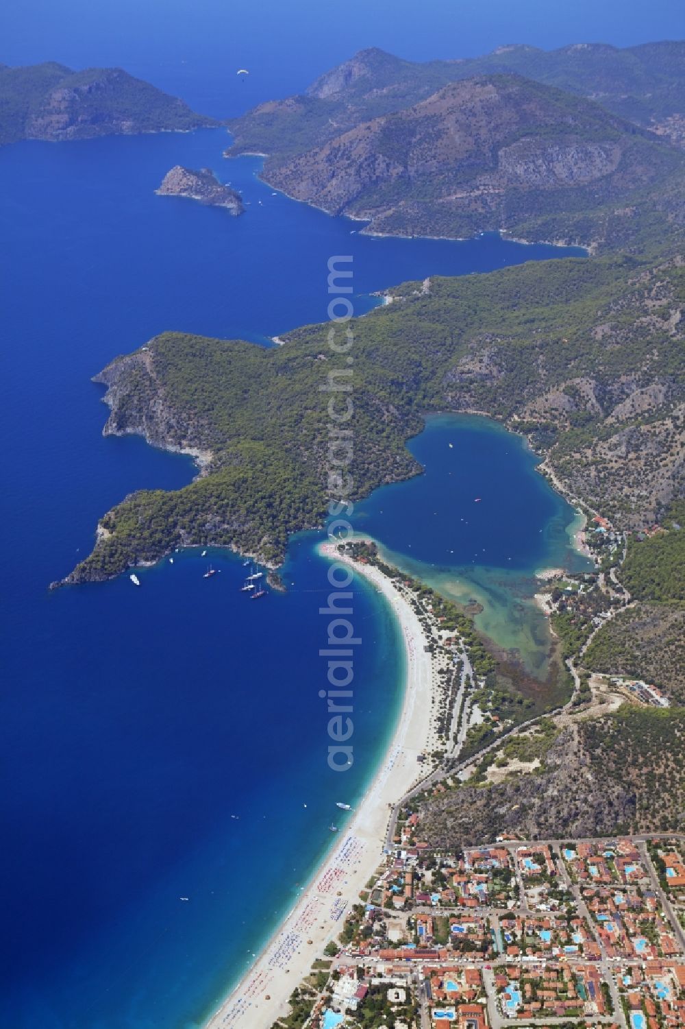 Ölüdeniz from the bird's eye view: Coastline with the sandy beach of Oeluedeniz in Turkey