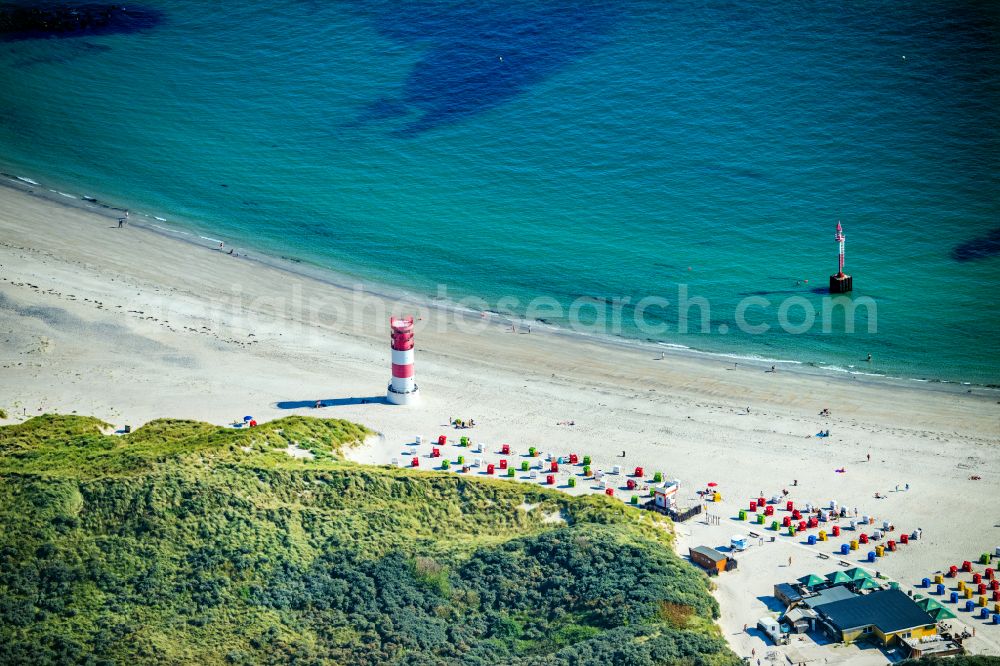 Helgoland from above - Coastal landscape on the sandy beach with the lighthouse on the Helgoland dune in Heligoland in the state of Schleswig-Holstein