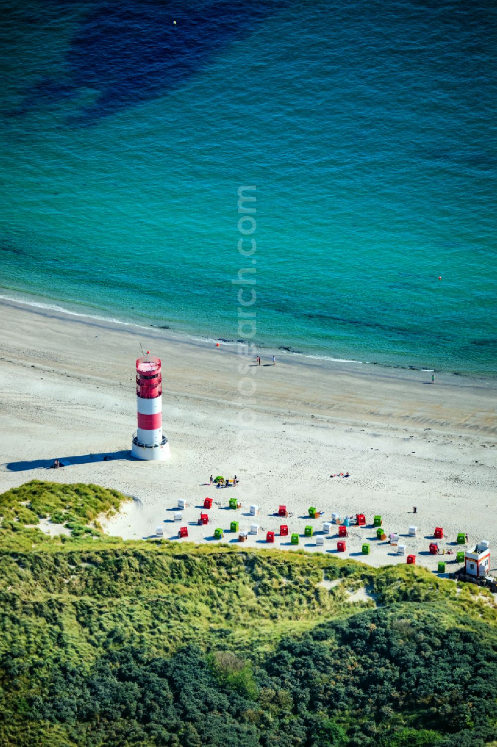 Helgoland from the bird's eye view: Coastal landscape on the sandy beach with the lighthouse on the Helgoland dune in Heligoland in the state of Schleswig-Holstein