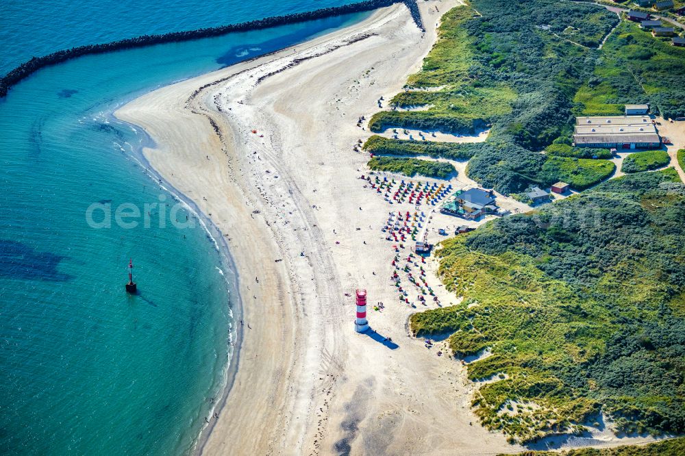 Helgoland from the bird's eye view: Coastal landscape on the sandy beach with the lighthouse on the Helgoland dune in Heligoland in the state of Schleswig-Holstein