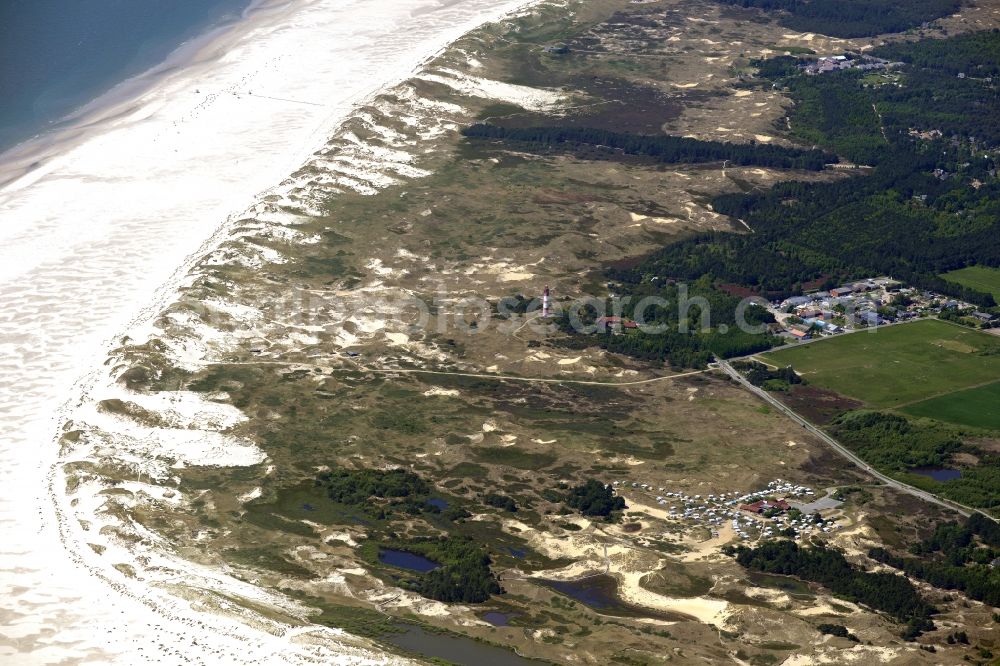 Aerial photograph Nebel - Coastline with lighthouse and camp site on the sandy beach of Nordsee- Insel Amrum in Nebel in the state Schleswig-Holstein