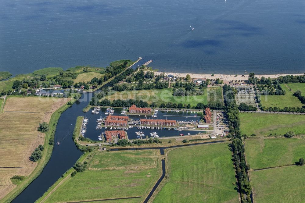 Aerial image Ueckermünde - Coastline on the sandy beach in the district Ueckermuende in Ueckermuende in the state Mecklenburg - Western Pomerania