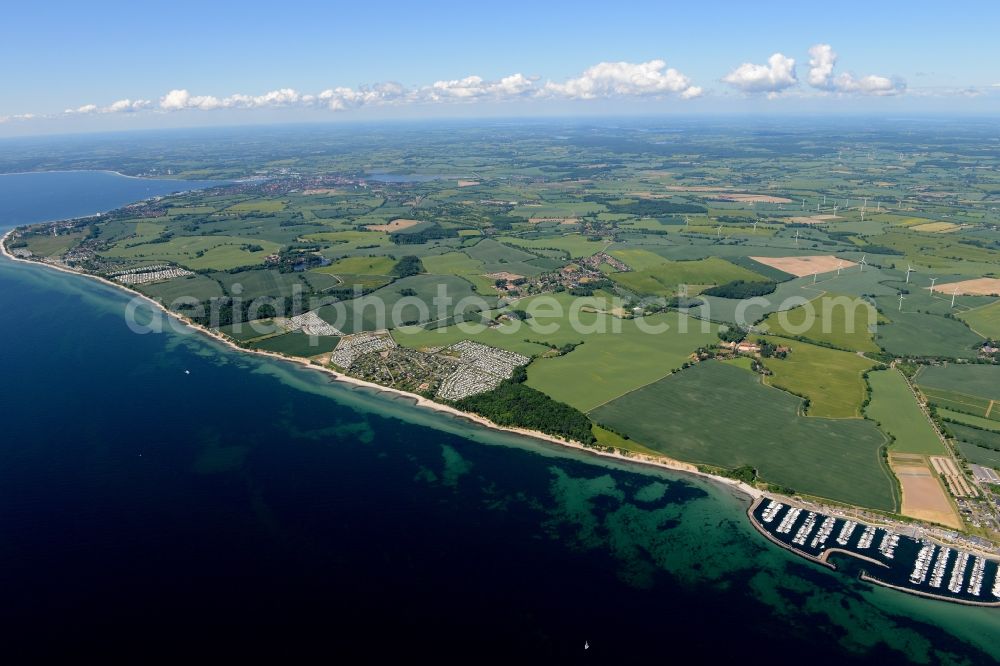 Schashagen from the bird's eye view: Coastline on the sandy beach of the baltic sea and nearby camping areas in Schashagen in the state Schleswig-Holstein