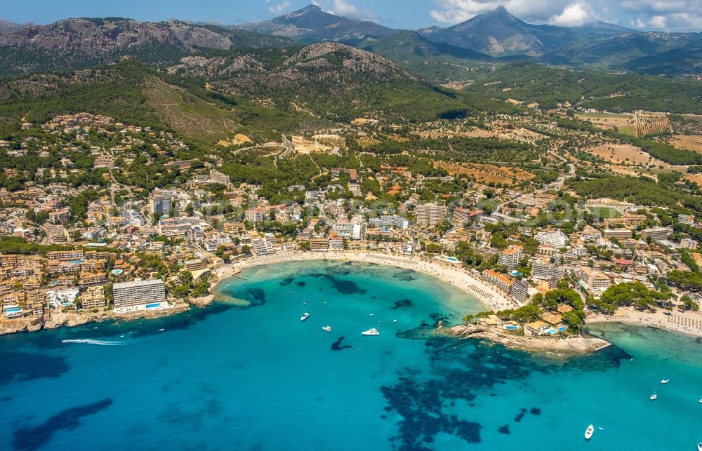 Peguera from the bird's eye view: Coastline on the sandy beach of Platja Gran de Tora in Peguera in Balearische Insel Mallorca, Spain