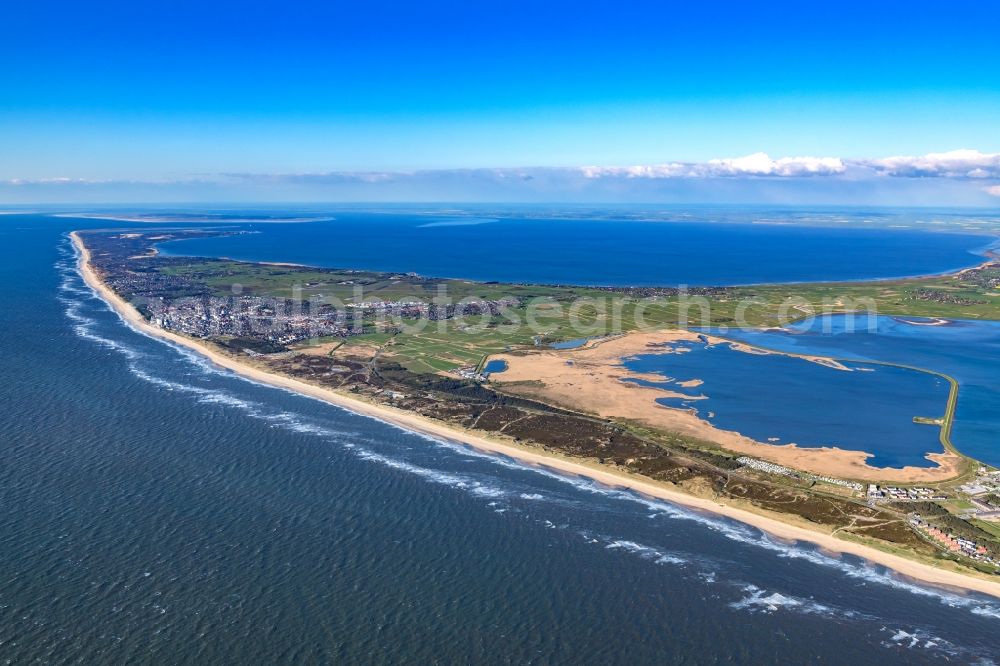 Sylt from the bird's eye view: Coastal landscape on the sandy beach and the Rantum basin on the North Sea island of Sylt near Rantum in the state Schleswig-Holstein, Germany