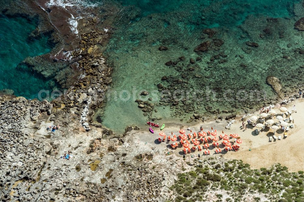 San Vito from the bird's eye view: Coastline on the sandy beach of in San Vito in Italy