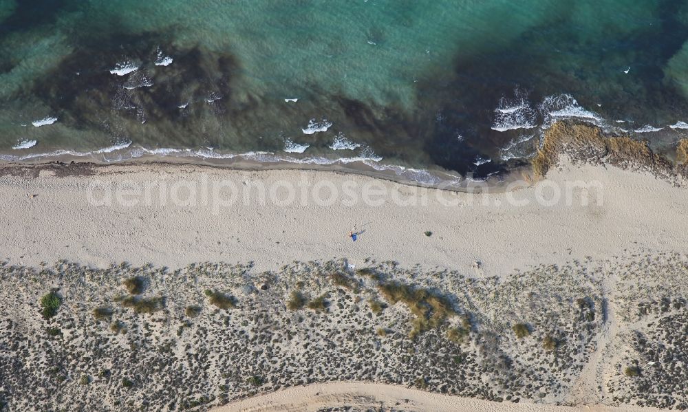 Santa Margalida from the bird's eye view: Coastline on the sandy beach of Son Serra de arina in Santa Margalida in Bay of Alcudia in Mallorca in Balearic Islands, Spain