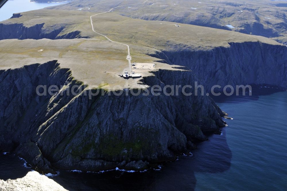 Nordkap from the bird's eye view: Coastal landscape on the cliffs of the Barents Sea - headland Knivskjellodden in North Cape in Norway