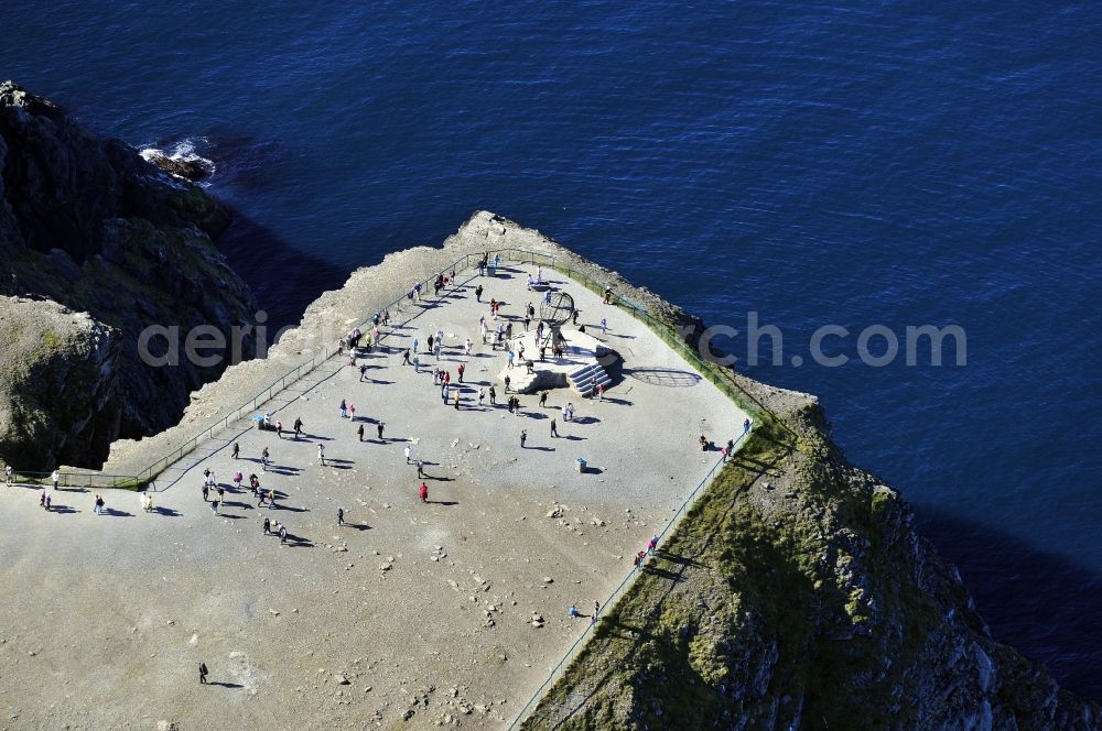 Nordkap from the bird's eye view: Coastal landscape on the cliffs of the Barents Sea - headland Knivskjellodden in North Cape in Norway