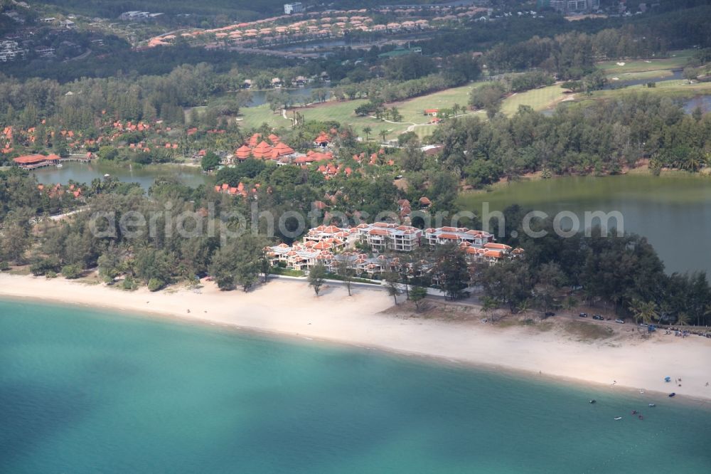 Aerial photograph Choeng Thale - Coastline with sandy beach, palm trees, luxury hotels and lagoon at Choeng Thale on the island of Phuket in Thailand