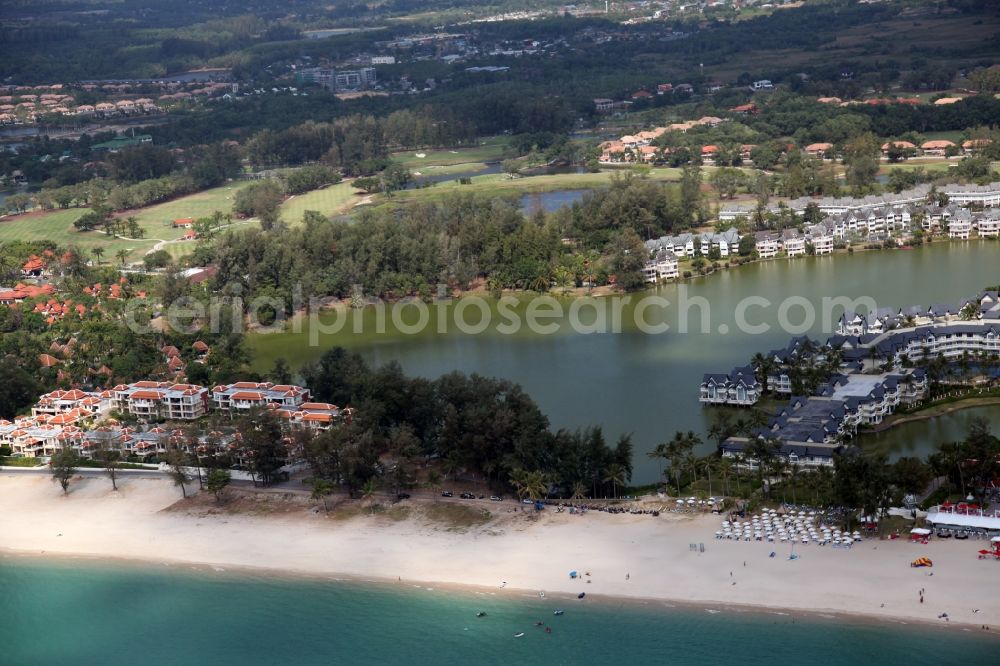 Choeng Thale from above - Coastline with sandy beach, palm trees, luxury hotels and lagoon at Choeng Thale on the island of Phuket in Thailand