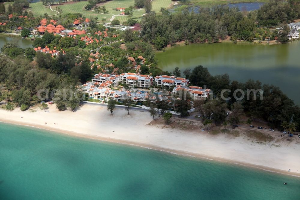 Aerial photograph Choeng Thale - Coastline with sandy beach, palm trees, luxury hotels and lagoon at Choeng Thale on the island of Phuket in Thailand