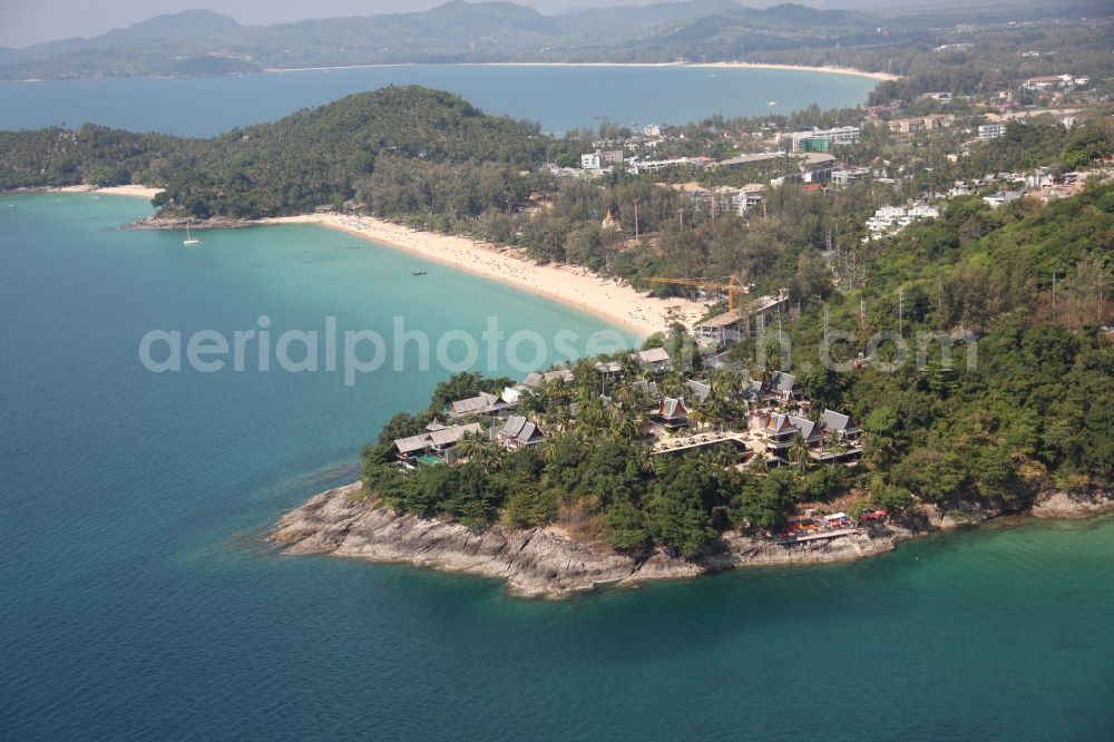 Aerial photograph Kammala - The coastal area near Kammala on the island of Phuket in Thailand is located in the west of the island. Behind the cliff is located the Surin Beach