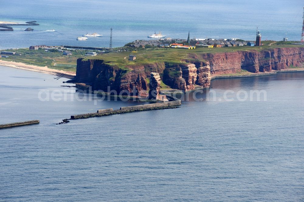 Helgoland from the bird's eye view: Coastal dune - island, it is the only addition to the German North Sea island of Helgoland in Helgoland in Schleswig-Holstein. It is used with its beaches as bathing island. In addition, here are the Heligoland Airport, the dunes harbor, accommodations and lighthouse Helgoland Dune