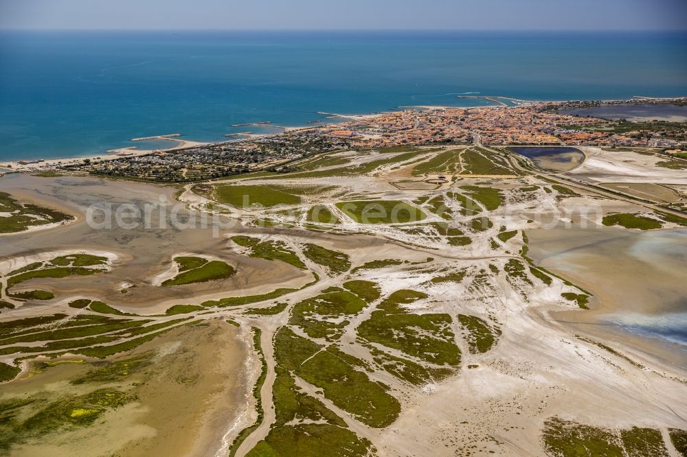 Aerial image Saintes-Maries-de-la-Mer - Coastal dunes and landscape of the Camargue at Saintes-Maries-de-la-Mer, Provence-Alpes-Cote d'Azur in France