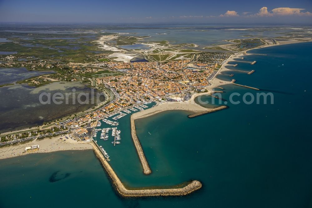 Saintes-Maries-de-la-Mer from the bird's eye view: Coastal dunes and landscape of the Camargue at Saintes-Maries-de-la-Mer, Provence-Alpes-Cote d'Azur in France