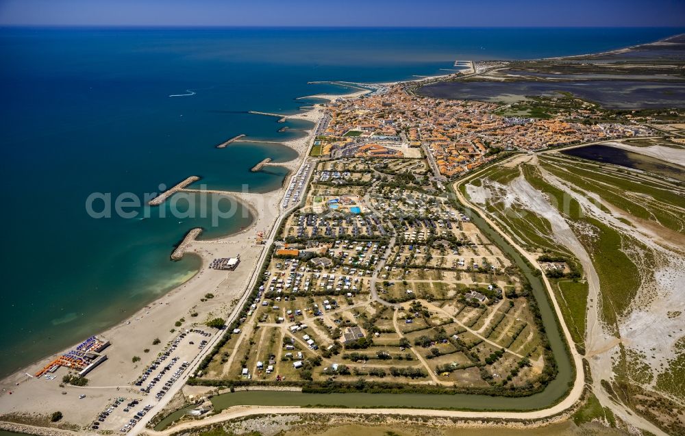 Saintes-Maries-de-la-Mer from above - Coastal dunes and landscape of the Camargue at Saintes-Maries-de-la-Mer, Provence-Alpes-Cote d'Azur in France