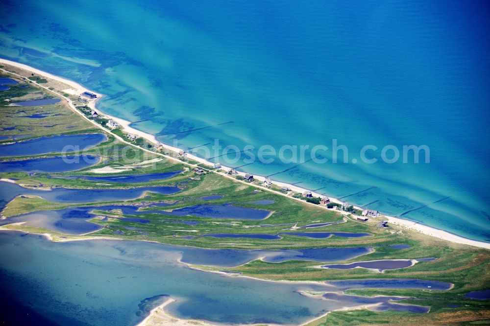 Heiligenhafen from above - Coastal area of the peninsula Graswarder-Heilgenhafen with a few single- family houses at the beach in Grossenbrode in the state Schleswig-Holstein