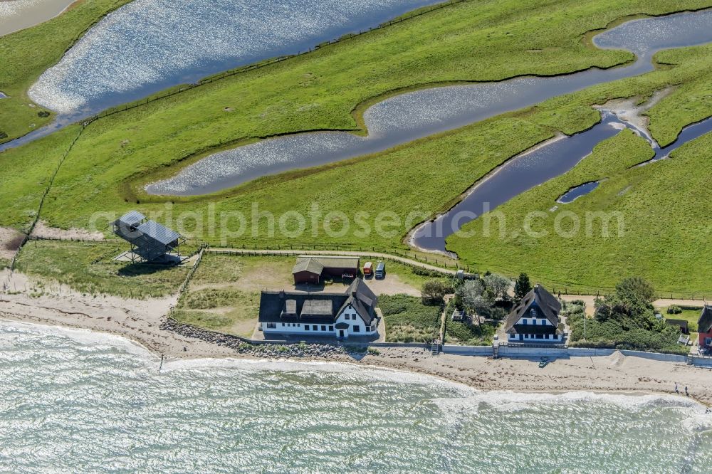 Aerial photograph Heiligenhafen - Coastal area of the peninsula Graswarder-Heilgenhafen with a few single- family houses at the beach in Grossenbrode in the state Schleswig-Holstein