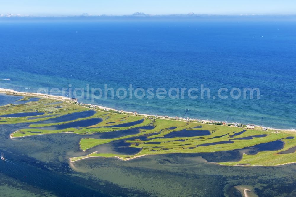 Aerial image Heiligenhafen - Coastal area of the peninsula Graswarder-Heilgenhafen with a few single- family houses at the beach in Grossenbrode in the state Schleswig-Holstein