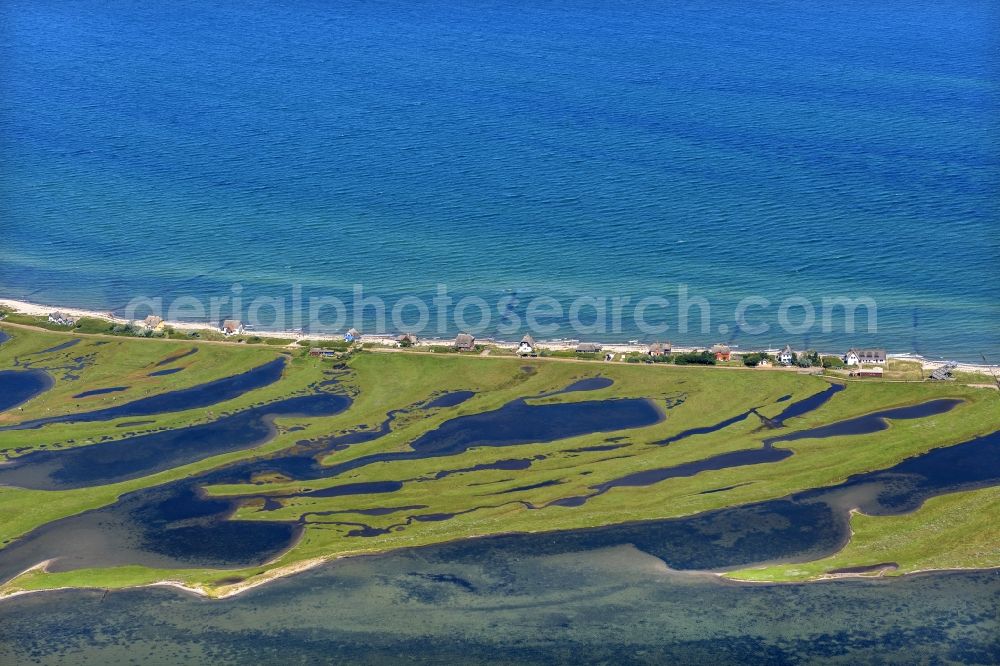 Aerial photograph Heiligenhafen - Coastal area of the peninsula Graswarder-Heilgenhafen with a few single- family houses at the beach in Grossenbrode in the state Schleswig-Holstein