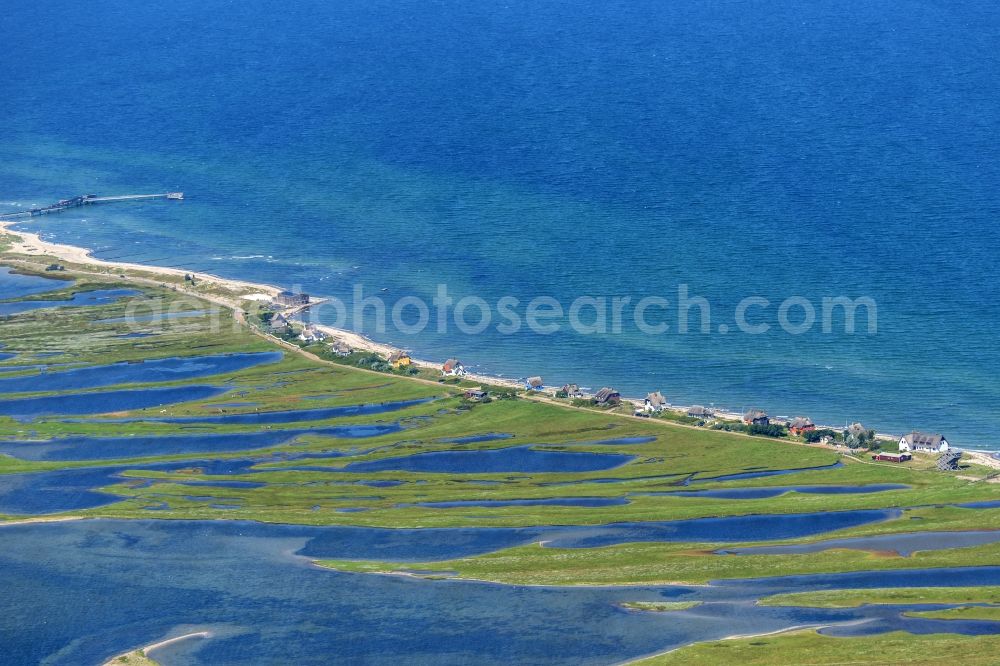 Heiligenhafen from the bird's eye view: Coastal area of the peninsula Graswarder-Heilgenhafen with a few single- family houses at the beach in Grossenbrode in the state Schleswig-Holstein