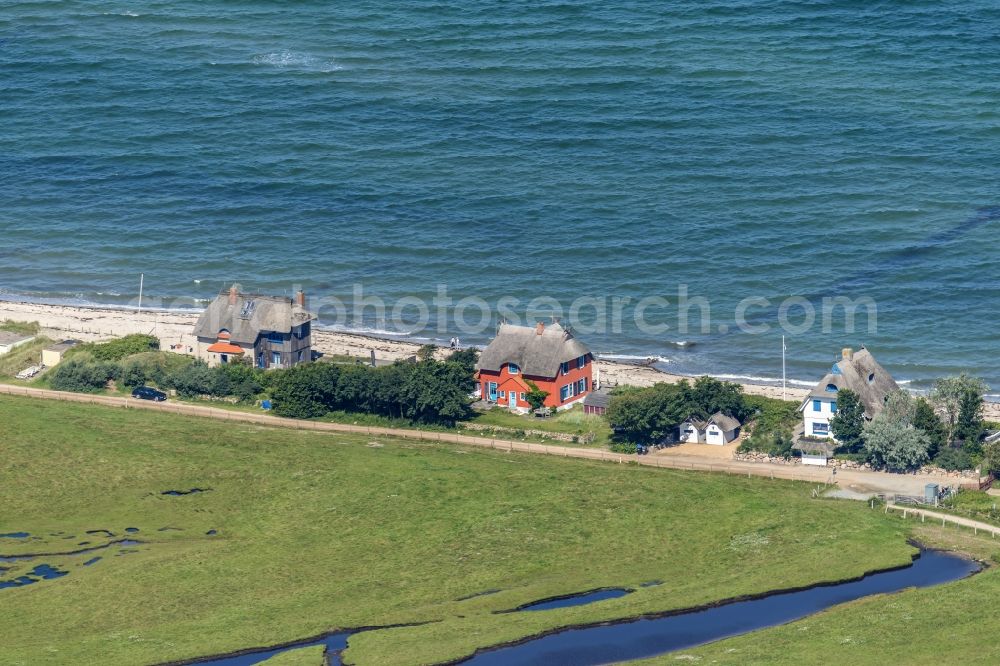 Aerial photograph Heiligenhafen - Coastal area of the peninsula Graswarder-Heilgenhafen with a few single- family houses at the beach in Grossenbrode in the state Schleswig-Holstein
