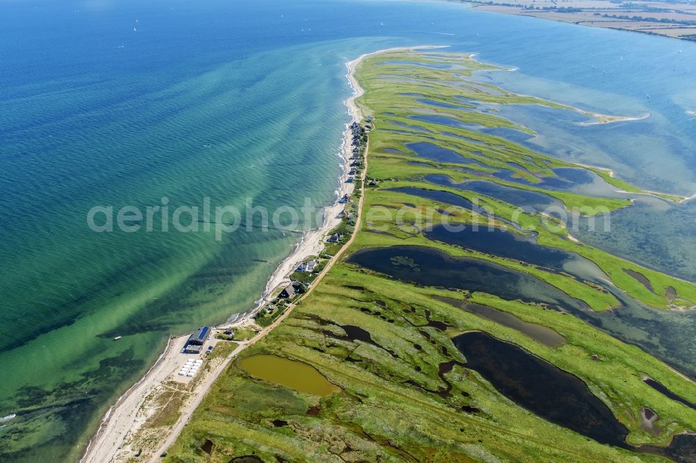 Heiligenhafen from above - Coastal area of the peninsula Graswarder-Heilgenhafen with a few single- family houses at the beach in Grossenbrode in the state Schleswig-Holstein