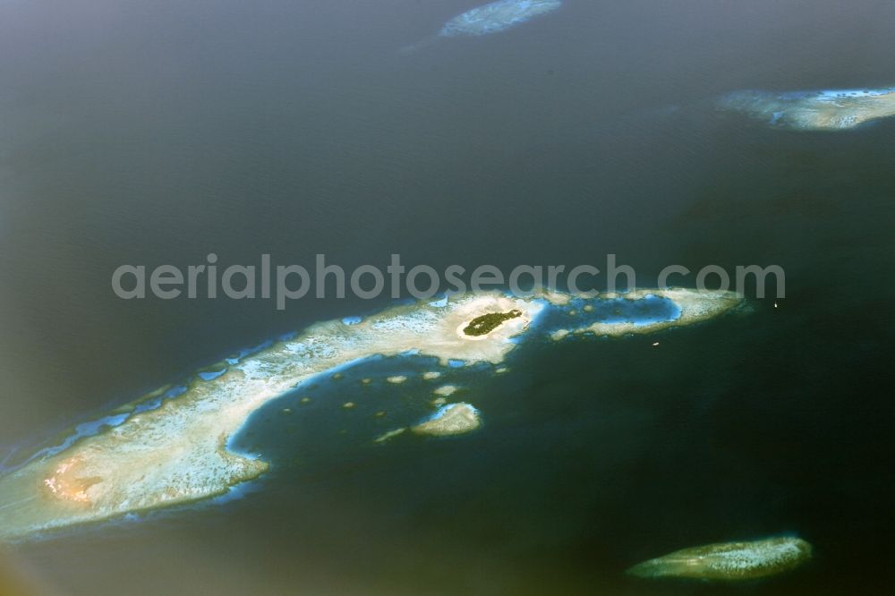 Dharanboodhoo from the bird's eye view: Coastal Indian Ocean - island in Dhahran Boodhoo in Central Province, Maldives