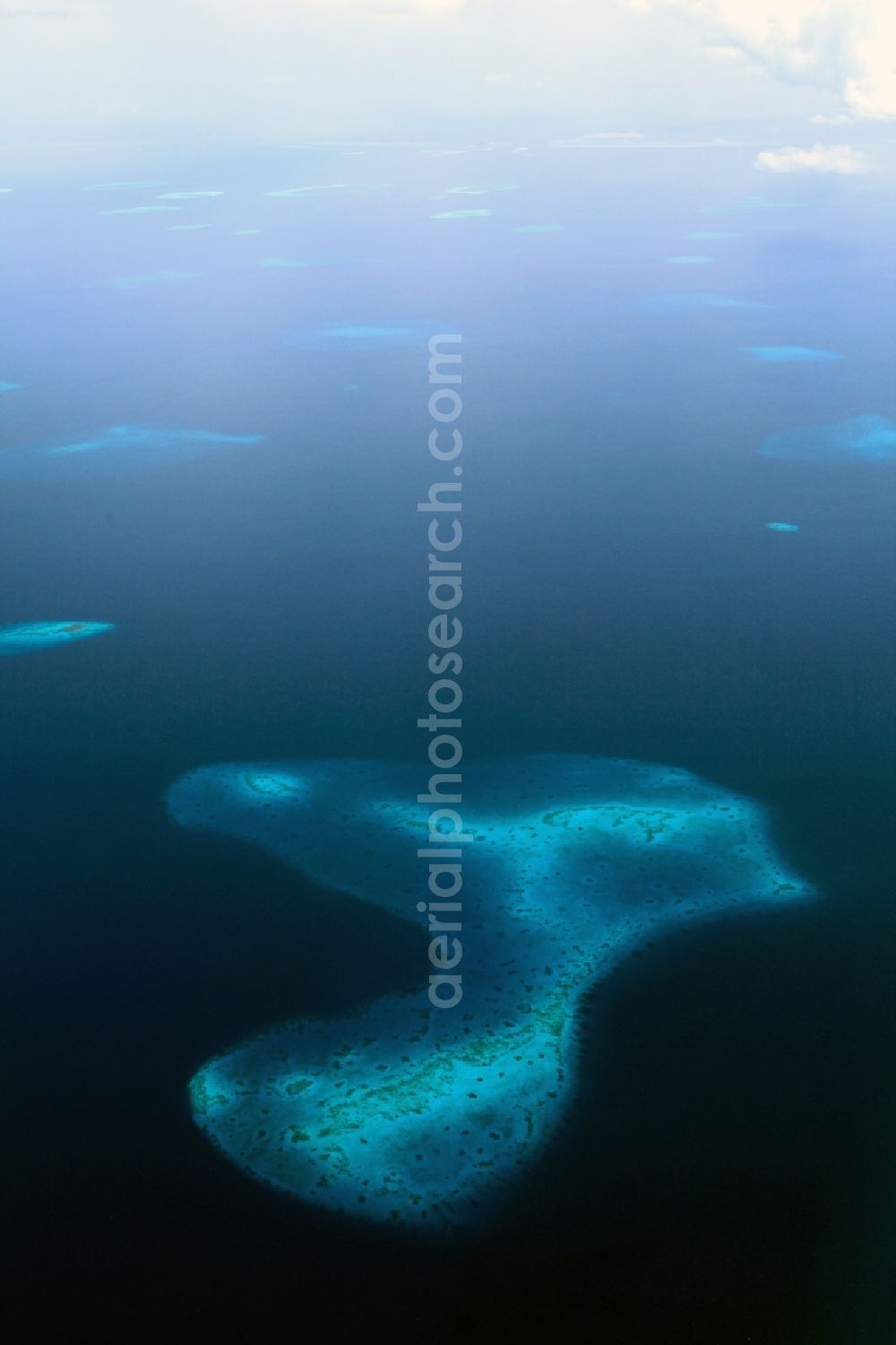 Dharanboodhoo from the bird's eye view: Coastal Indian Ocean - island in Dhahran Boodhoo in Central Province, Maldives